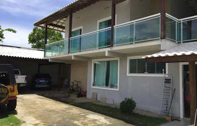 Imagem: A casa possui 5 Dormitórios, 5 Banheiros, 5 Vagas na garagem