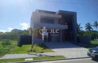 Imagem: A casa em condomínio possui 4 Dormitórios, 5 Banheiros, 2