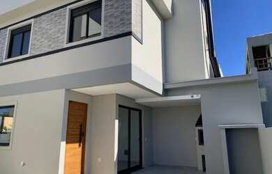 Imagem: A casa possui 2 Dormitórios, 3 Banheiros, 2 Vagas na garagem