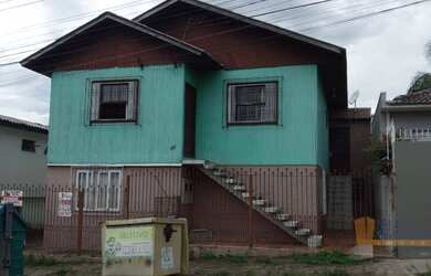 Imagem: A casa possui 3 Dormitórios, 1 Banheiro, 93m² de Área e