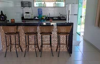 Imagem: A casa possui 4 Dormitórios, 4 Banheiros, 4 Vagas na garagem