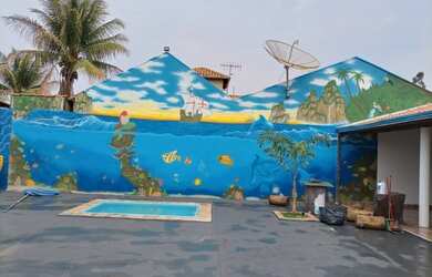 Imagem: A casa possui 2 Dormitórios, 2 Vagas na garagem e está localizado