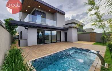 Imagem: A casa em condomínio possui 4 Dormitórios, 5 Banheiros, 4