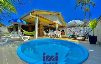 Imagem: A casa possui 5 Dormitórios, 4 Banheiros, 4 Vagas na garagem