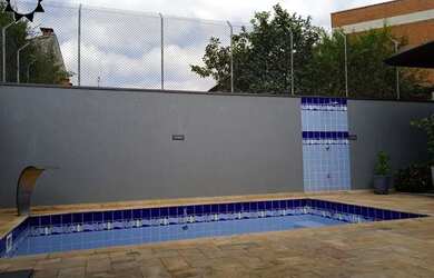 Imagem: A casa possui 3 Dormitórios, 4 Banheiros, 4 Vagas na garagem