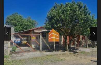 Imagem: A casa possui 2 Dormitórios, 2 Banheiros, 3 Vagas na garagem