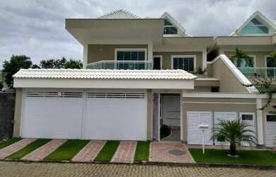 Imagem: A casa em condomínio possui 5 Dormitórios, 5 Banheiros e 2