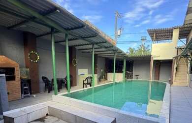 Imagem: A casa possui 3 Dormitórios, 3 Banheiros, 3 Vagas na garagem