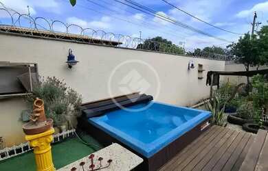 Imagem: A casa possui 5 Dormitórios, 5 Banheiros, 2 Vagas na garagem