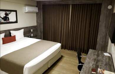 Imagem: O apartamento possui 1 Dormitório e 2 Banheiros e está localizado