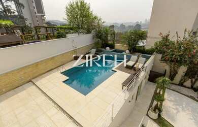 Imagem: A casa em condomínio possui 4 Dormitórios, 5 Banheiros, 4