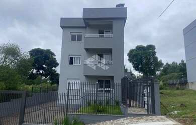 Imagem: O apartamento possui 2 Dormitórios, 1 Banheiro, 2 Vagas na