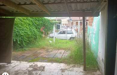 Imagem: A casa possui 1 Dormitório, 1 Banheiro, 2 Vagas na garagem