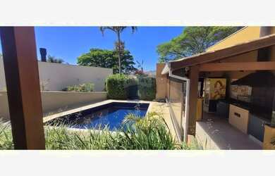 Imagem: A casa em condomínio possui 4 Dormitórios, 5 Banheiros, 3