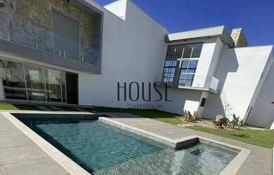 Imagem: A casa em condomínio possui 4 Dormitórios, 5 Banheiros, 4