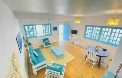 Imagem: A casa possui 3 Dormitórios, 2 Banheiros, 4 Vagas na garagem