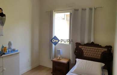 Imagem: A casa possui 3 Dormitórios, 5 Banheiros, 4 Vagas na garagem