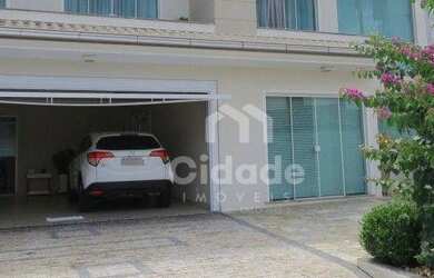 Imagem: A casa possui 3 Dormitórios, 3 Banheiros, 3 Vagas na garagem