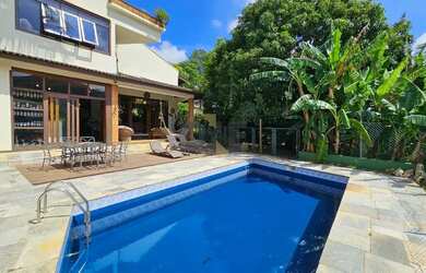 Imagem: A casa em condomínio possui 4 Dormitórios, 5 Banheiros, 5