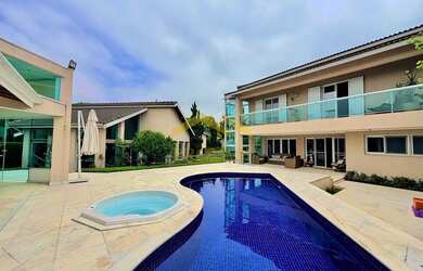 Imagem: A casa em condomínio possui 4 Dormitórios, 5 Banheiros, 4