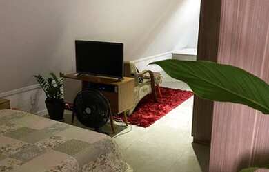 Imagem: A casa possui 3 Dormitórios, 5 Banheiros, 2 Vagas na garagem