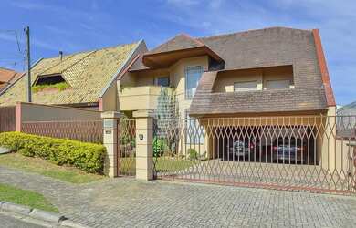 Imagem: A casa possui 5 Dormitórios, 5 Banheiros, 5 Vagas na garagem