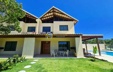 Imagem: A casa possui 4 Dormitórios, 4 Banheiros, 2 Vagas na garagem