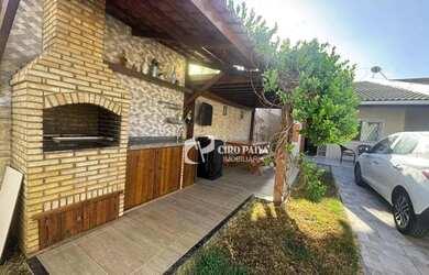 Imagem: A casa possui 3 Dormitórios, 3 Banheiros, 3 Vagas na garagem