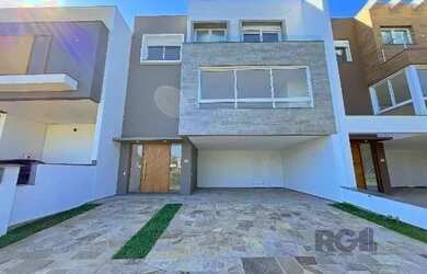 Imagem: A casa em condomínio possui 3 Dormitórios, 3 Banheiros, 2