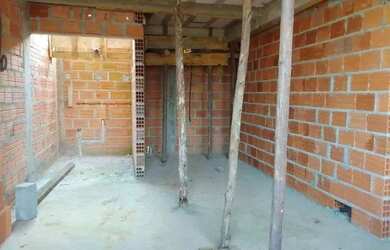 Imagem: A casa possui 3 Dormitórios, 2 Banheiros, 3 Vagas na garagem