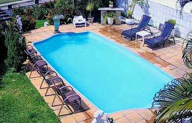 Imagem: A casa possui 3 Dormitórios, Imóvel mobiliado e está localizado