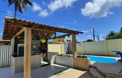 Imagem: A casa possui 5 Dormitórios, 5 Banheiros, 5 Vagas na garagem