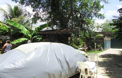 Imagem: A casa possui 4 Dormitórios, 3 Banheiros, 3 Vagas na garagem