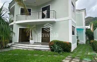 Imagem: A casa possui 5 Dormitórios, 5 Banheiros, 2 Vagas na garagem