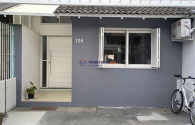 Imagem: A casa à venda possui 2 Dormitórios, 2 Banheiros, 2 Vagas