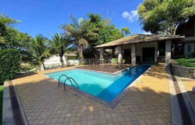 Imagem: A casa em condomínio possui 5 Dormitórios, 5 Banheiros, 4