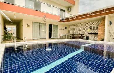 Imagem: A casa possui 3 Dormitórios, 3 Banheiros, 2 Vagas na garagem