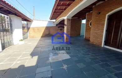 Imagem: A casa possui 3 Dormitórios, 3 Banheiros, 3 Vagas na garagem