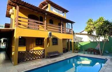 Imagem: A casa possui 5 Dormitórios, 5 Banheiros, 5 Vagas na garagem