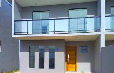 Imagem: A casa possui 3 Dormitórios, 3 Banheiros, 2 Vagas na garagem