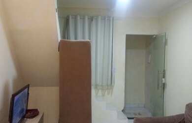 Imagem: A casa possui 2 Dormitórios, 2 Banheiros e está localizado