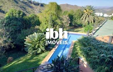 Imagem: A casa possui 3 Dormitórios, 4 Banheiros, 2 Vagas na garagem