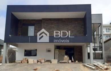 Imagem: A casa em condomínio possui 5 Dormitórios, 5 Banheiros, 5