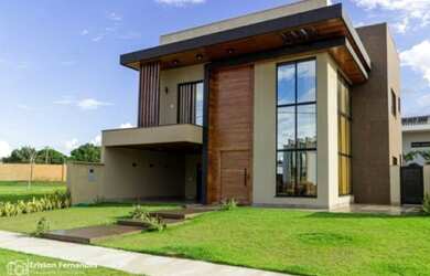 Imagem: A casa possui 4 Dormitórios, 4 Banheiros, 2 Vagas na garagem