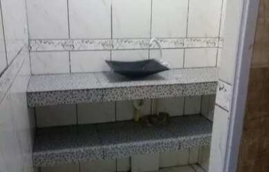 Imagem: A casa possui 2 Dormitórios, 1 Banheiro, Varanda e está localizado