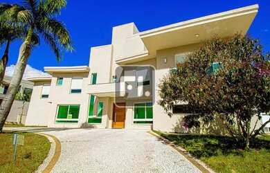 Imagem: A casa em condomínio possui 4 Dormitórios, 5 Banheiros, 5