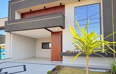 Imagem: A casa possui 4 Dormitórios, 4 Banheiros, 3 Vagas na garagem