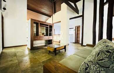 Imagem: A casa possui 3 Dormitórios, 5 Banheiros, 5 Vagas na garagem