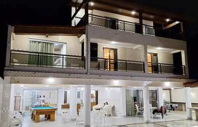 Imagem: A casa possui 5 Dormitórios, 5 Banheiros, 5 Vagas na garagem