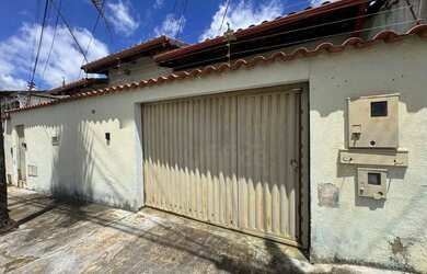 Imagem: A casa possui 3 Dormitórios, 3 Banheiros, 3 Vagas na garagem